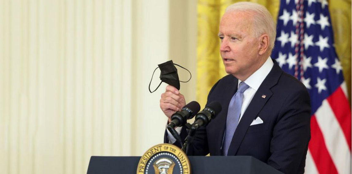 Biden hits Russia with sanctions, shifts troops to Germany