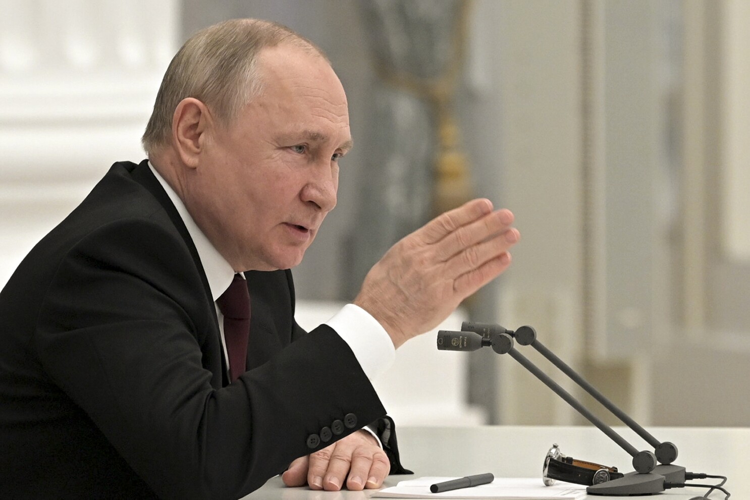 Putin promises response to strategic threats