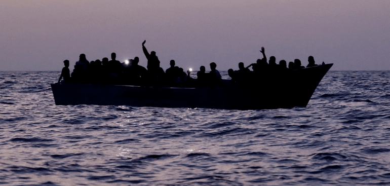 More than 70 dead after a boat carrying migrants and refugees sinks off Syria