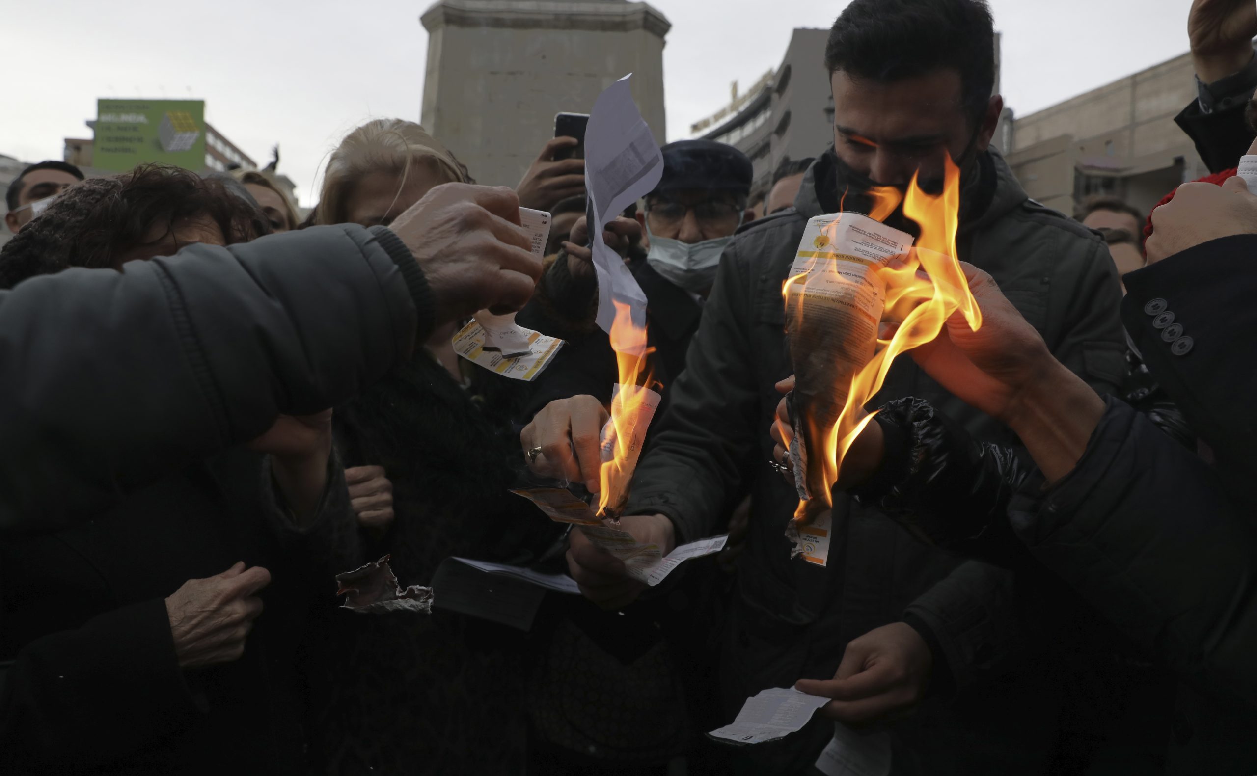 British citizens burn energy bills to protest soaring prices