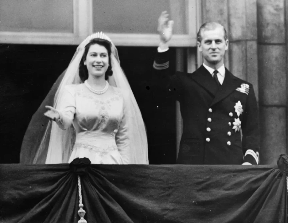 Princess Elizabeth and Prince Philip duke of Edinburgh wave to a crowd from the balcony of Buckingham Palace on November 20 1947 shortly after their wedding at Westminster Abbey
